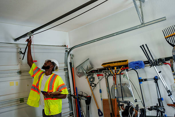 Professional Garage Door Panel Replacement technician working in Astoria, OR